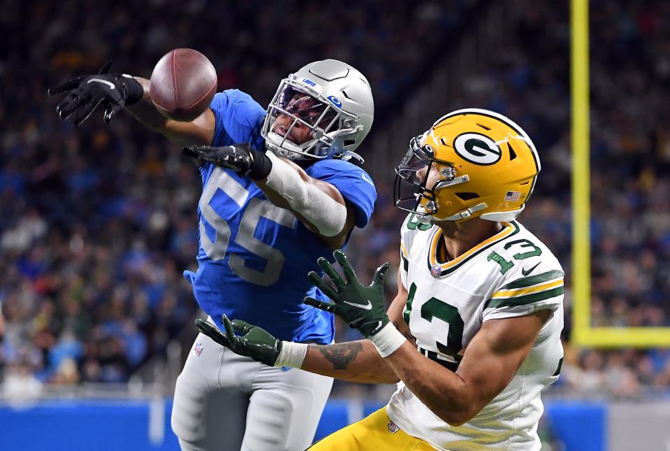 Allen Lazard catches a touchdown pass against the Detroit Lions on Jan. 9, 2022 at Ford Field.