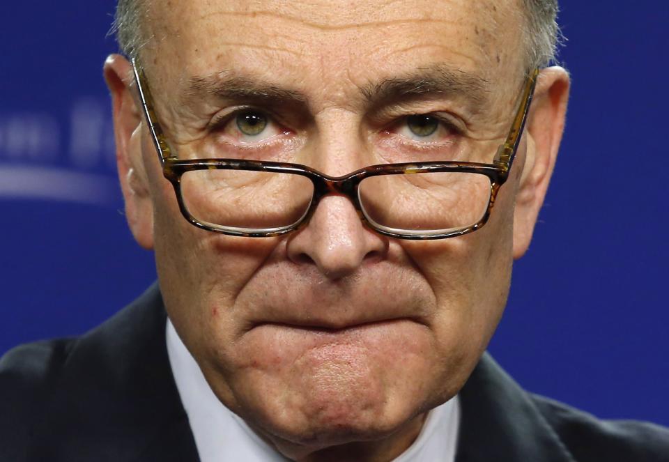 Sen. Charles Schumer (D-NY) pauses as he delivers remarks about the Rise of the Tea Party and How Progressives Can Fight Back at the Center for American Progress Action Fund in Washington January 23, 2014. REUTERS/Yuri Gripas (UNITED STATES - Tags: POLITICS)