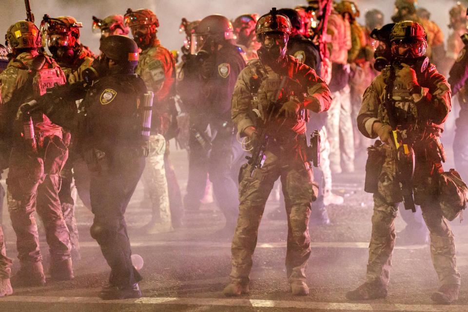 Federal police under the orders of Donald Trump launch tear gas after a demonstration in Portland, Oregon on July 23, 2020. (Photo: John Rudoff/Anadolu Agency via Getty Images)