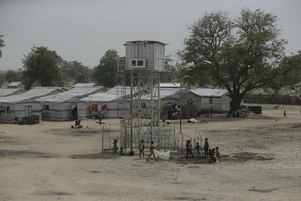 In this photo taken on Thursday, Feb. 21, 2019, children displaced by Islamist extremist play at Malkohi camp in Yola, Nigeria. For those who live in the makeshift camp for Nigerians who have fled Boko Haram violence, the upcoming presidential vote isn’t a topic of conversation, because nearly all are more worried about putting food on the table. (AP Photo/ Sunday Alamba)