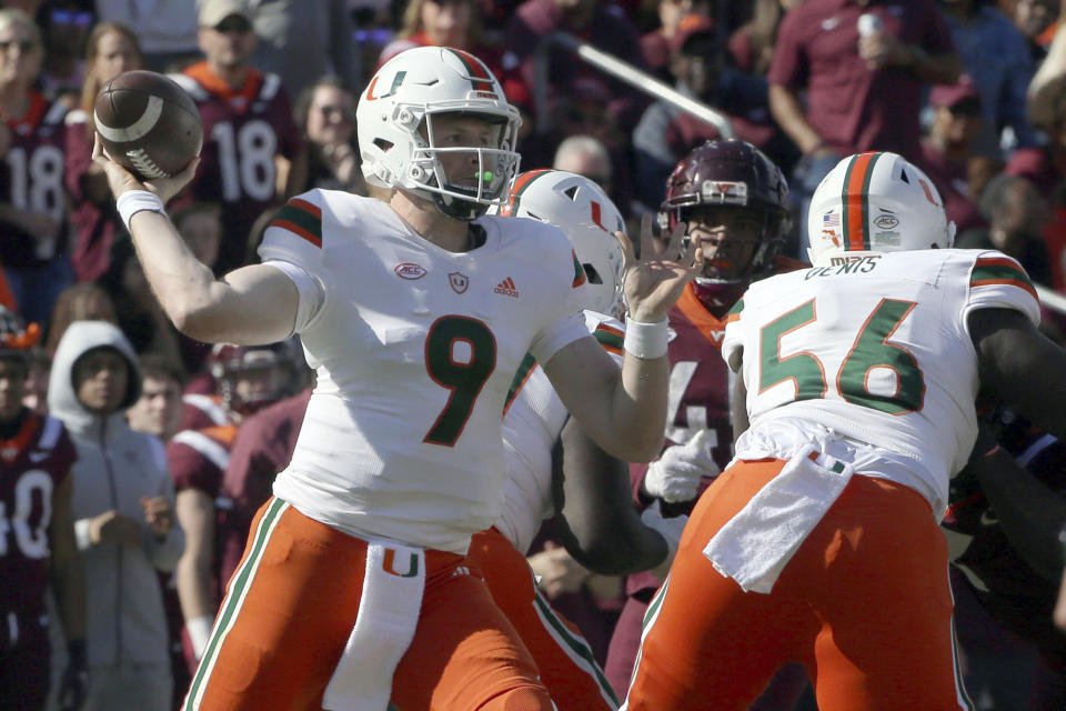 Miami quarterback Tyler Van Dyke (9) throws in the second half of an NCAA football game against Virginia Tech, Saturday Oct. 15 2022, in Blacksburg Va. (Matt Gentry/The Roanoke Times via AP)