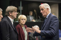 CORRECTING DATE TO MONDAY - Chief Brexit negotiator for the EU Michel Barnier, right, talks with MEP Guy Verhofstadt, in Strasbourg, eastern France, Monday Oct. 21 2019. The EU has launched its own Brexit ratification process, and Barnier will debrief the European Parliament Brexit steering group Monday in Strasbourg. (AP Photo/Jean-Francois Badias)