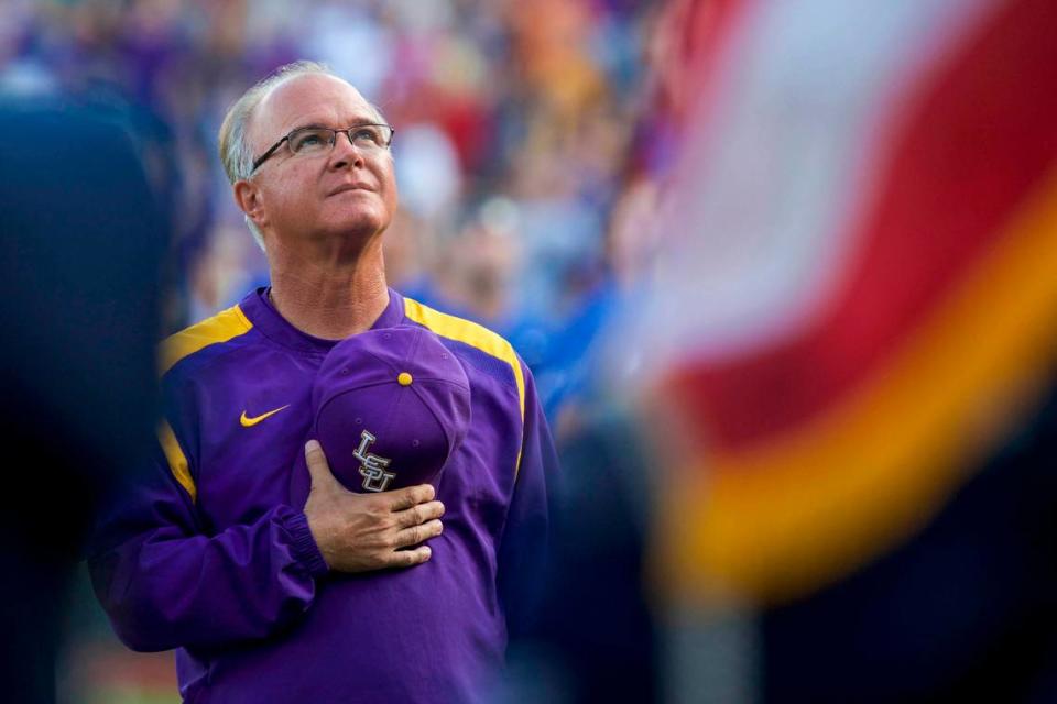 Jun 26, 2017; Omaha, NE, USA; LSU Tigers head coach Paul Mainieri watches the military flyover during the National Anthem prior to the game agianst the Florida Gators in game one of the championship series of the 2017 College World Series at TD Ameritrade Park Omaha.