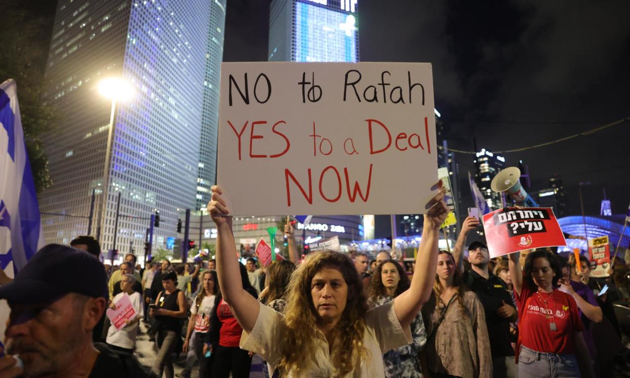 <span>Protesters block the Ayalon highway in Tel Aviv to call for a ceasefire and the immediate release of hostages.</span><span>Photograph: Abir Sultan/EPA</span>