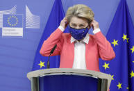 European Commission President Ursula von der Leyen arrives to deliver a statement at the EU headquarters in Brussels, Sunday, Dec. 13, 2020. Britain and the European Union say talks will continue on a free trade agreement — a deal that if sealed would avert New Year's chaos for cross-border traders and bring a measure of certainty for businesses after years of Brexit turmoil. (Olivier Hoslet/Pool Photo via AP)