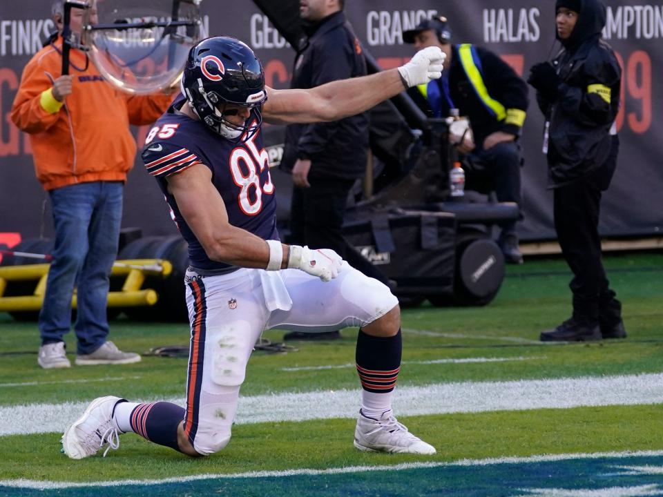 Cole Kmet celebrates a touchdown against the Miami Dolphins.