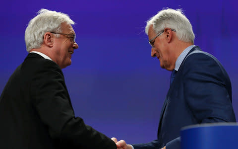 United Kingdom's Secretary of State for Exiting the European Union, David Davis (L) and European Chief Negotiator for Brexit, Michel Barnier 