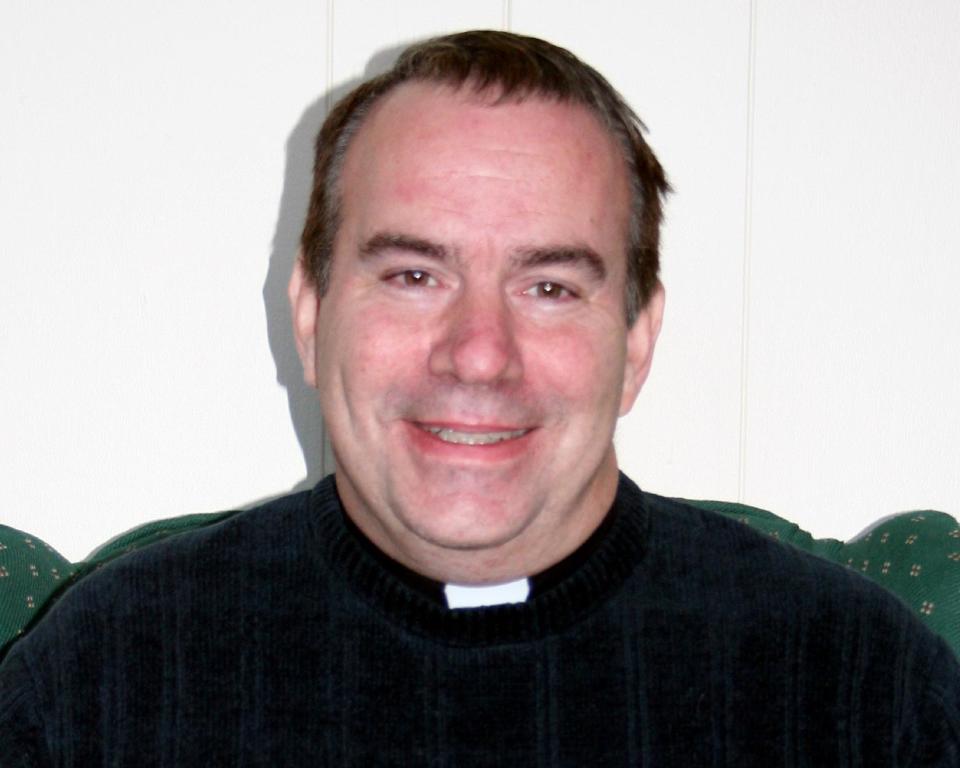 In this undated 2008 photo provided by Press Publications is the Rev. Jon Shelley. Minnesota prosecutors said Wednesday, Jan. 29, 2014 they would not charge Shelley, an archdiocesan priest who had been accused of possessing child pornography. His case was among several that raised questions about the Minneapolis-St. Paul archdiocese's handling of abuse cases after a church insider went public with her concerns. (AP Photo/Press Publications, Deb Barnes)