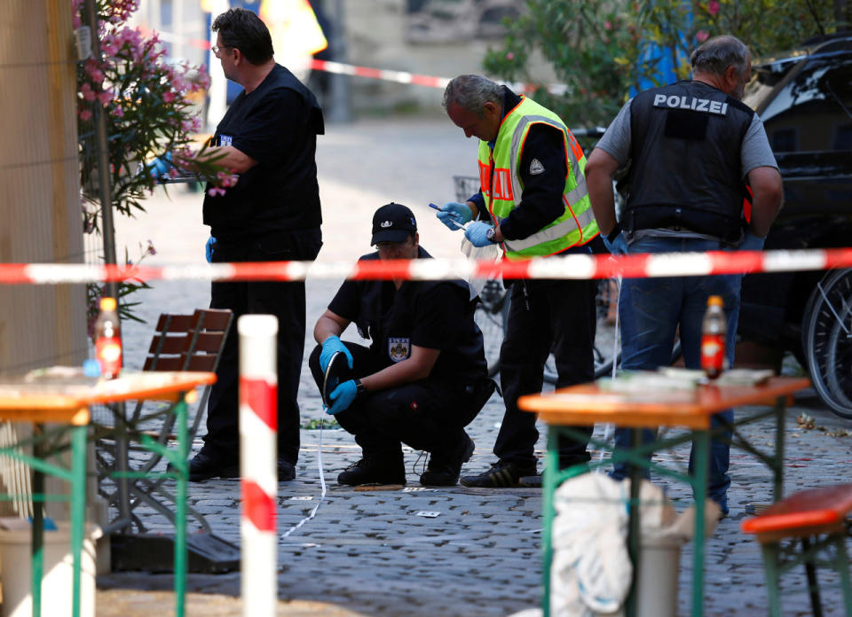 <p>Police secure the area after an explosion in Ansbach, Germany, July 25, 2016. (REUTERS/Michaela Rehle)</p>