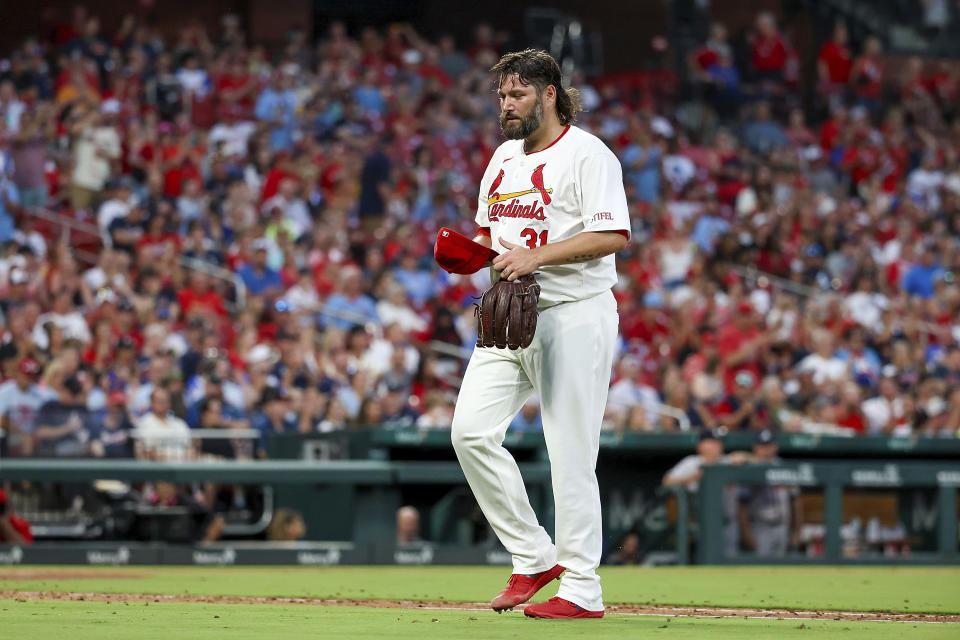 St. Louis Cardinals starting pitcher Lance Lynn walks to the dugout after being relieved during the seventh inning of a baseball game against the Atlanta Braves, Monday, June 24, 2024, in St. Louis. (AP Photo/Scott Kane)