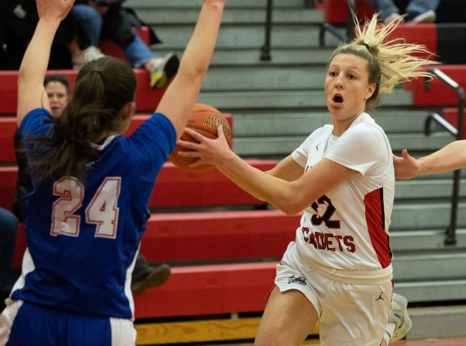 Hilton's Ella Clark drives to the basket against Fairport Friday, Jan. 19 at Hilton High School.