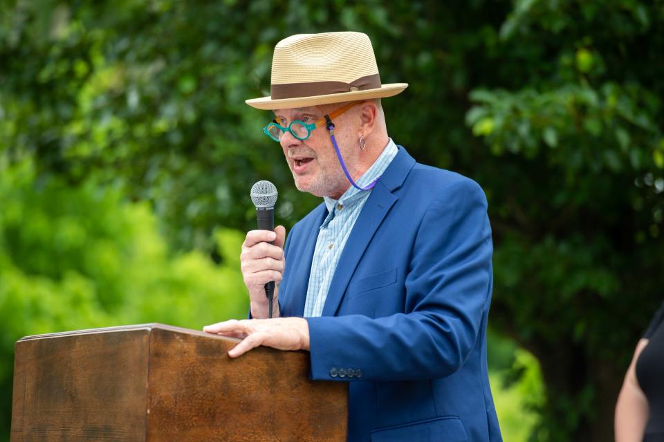 Sculptor Aaron Lee Benson speaks during the Trail of Truth dedication in Shirlene Mercer Park on Wednesday, May 24, 2023.