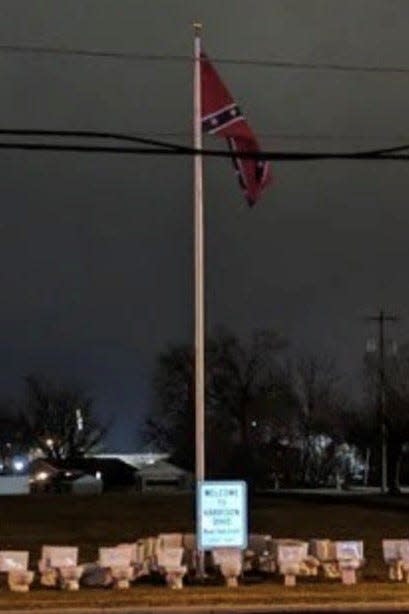 Toilets were added recently to Confederate flag displays on a private property in Harrison, Ohio.