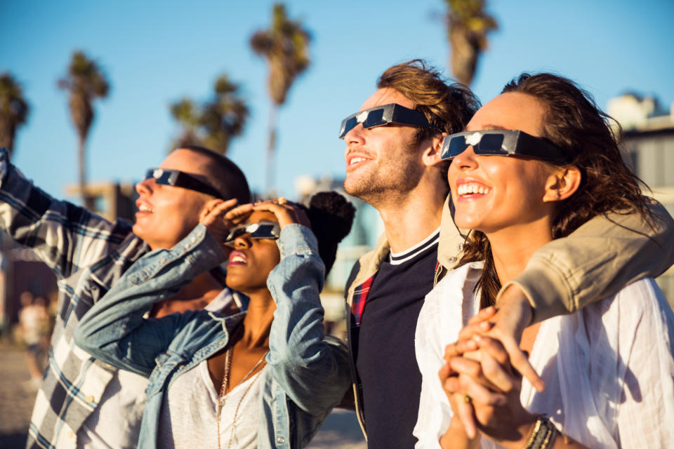 Friends in Santa Monica - Los Angeles having fun on the promenade. Staring at the sun can cause irreversible damage to your eyes. We've rounded up Amazon's best deals on protective eclipse glasses this spring. (Getty)