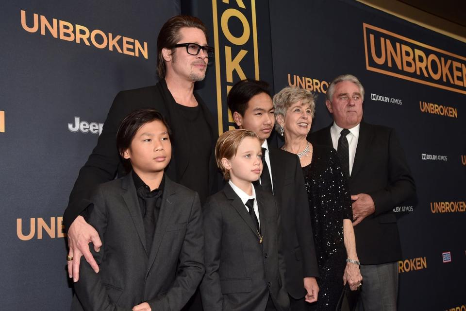 Pitt with children Pax Thien, Shiloh Nouvel, Maddox, and his parents Jane Pitt, and William Pitt in 2014 (Getty)