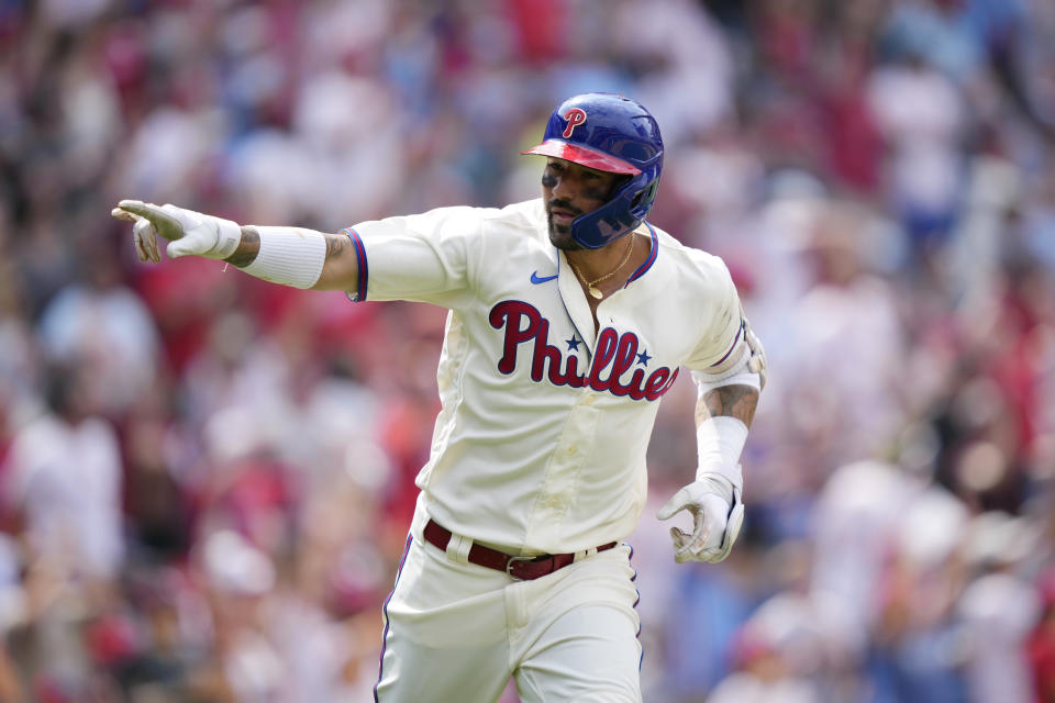 Philadelphia Phillies' Nick Castellanos reacts after hitting a two-run home run against Kansas City Royals pitcher Jonathan Heasley during the fifth inning of a baseball game, Sunday, Aug. 6, 2023, in Philadelphia. (AP Photo/Matt Slocum)