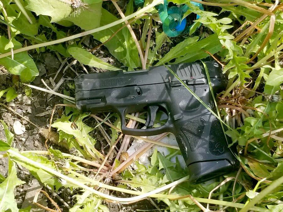 A gun was recovered from the scene.