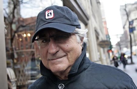 Bernard Madoff walks back to his apartment in New York December 17, 2008. REUTERS/Shannon Stapleton