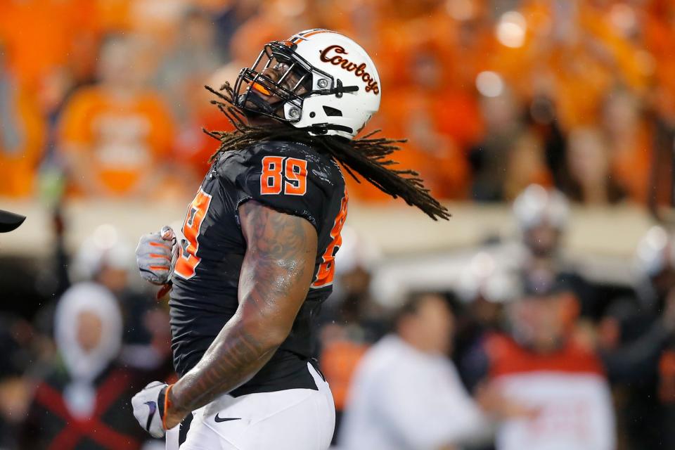 Tyler Lacy celebrates a sack during Oklahoma State's 34-17 rout of Arizona State on Sept. 10 in Stillwater.