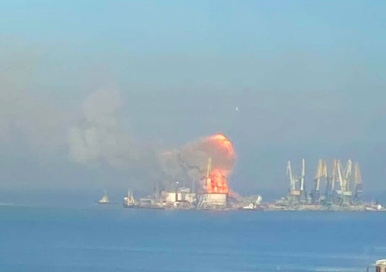 Footage showing a column of smoke rising up from a blaze beside the dock, along with a flash of an explosion. (Facebook)