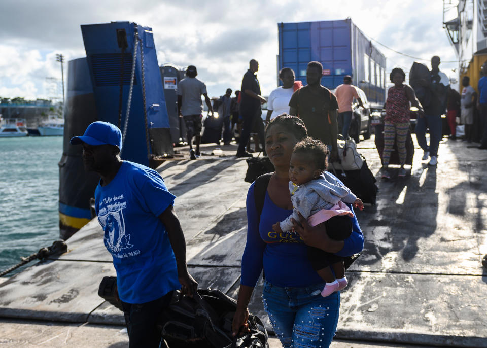 Evacuees get off a ferry after leaving Marsh Harbour on Abaco Island in the aftermath of hurricane Dorian on Sept. 9. President Donald Trump said Monday that the U.S. would have to be careful about allowing Bahamian survivors into the country. (Photo: ANDREW CABALLERO-REYNOLDS/AFP via Getty Images)