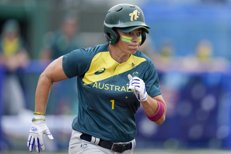 Australia's Jade Wall runs to first base during the softball game between the Italy and Australia at the 2020 Summer Olympics, Thursday, July 22, 2021, in Fukushima , Japan. (AP Photo/Jae C. Hong)