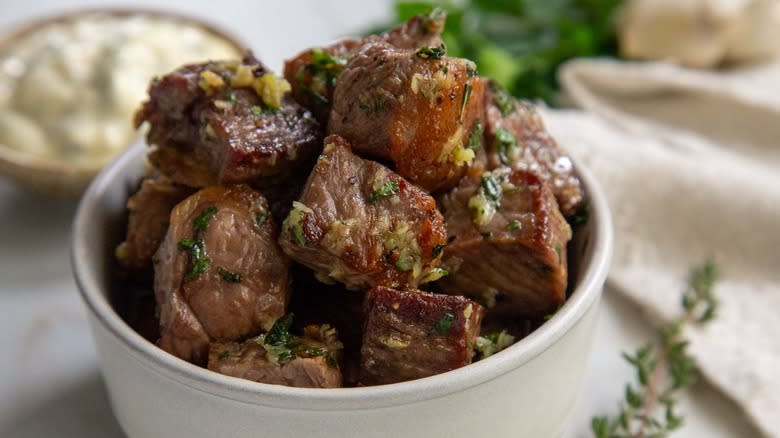 garlic and herb steak bites in bowl