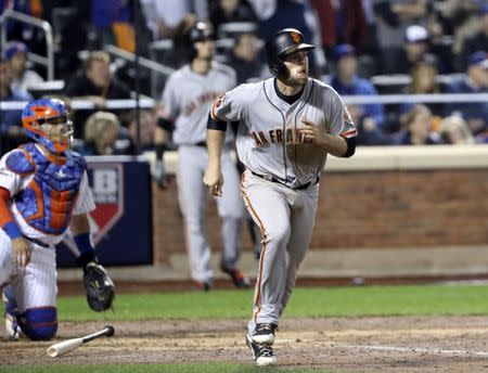 Oct 5, 2016; New York City, NY, USA; San Francisco Giants third baseman Conor Gillaspie (21) runs the bases after hitting a three run home run during the ninth inning against the New York Mets in the National League wild card playoff baseball game at Citi Field. Mandatory Credit: Anthony Gruppuso-USA TODAY Sports