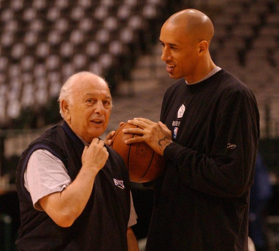 Sacramento Kings special assistant Pete Carril talks with Kings guard Doug Christie before the start of practice in 2003 at the American Airlines Center in Dallas, the day before the team faced the Mavericks in Game 2 of the Western Conference Semifinals.