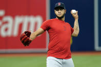 Boston Red Sox starting pitcher Eduardo Rodriguez warms up during the baseball team's practice Wednesday, Oct. 6, 2021, in St. Petersburg, Fla., for an AL Division Series matchup against the Tampa Bay Rays that starts Thursday. (AP Photo/Chris O'Meara)