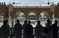 <p>Muslim pilgrims pray in front of the Kaaba, the cubic building at the Grand Mosque, ahead of the annual hajj pilgrimage, in the Muslim holy city of Mecca, Saudi Arabia, Tuesday, Aug. 29, 2017. (Photo: Khalil Hamra/AP) </p>