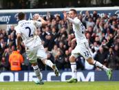 <p>The former Fulham attacking midfielder took the number 2 upon his move to White Hart Lane. A classic full back number. Some say it was due to his preferred number (23) being taken up, others say it was due to his rap name (Deuce). </p>