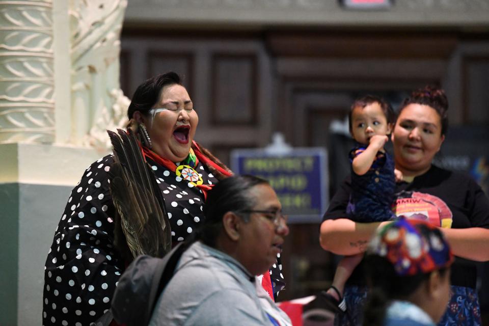 Candi Brings Plenty sings with a drum circle at the inaugural Two-Spirit Wacipi in Sioux Falls on Thursday, June 16, 2022, at the Multicultural Center.