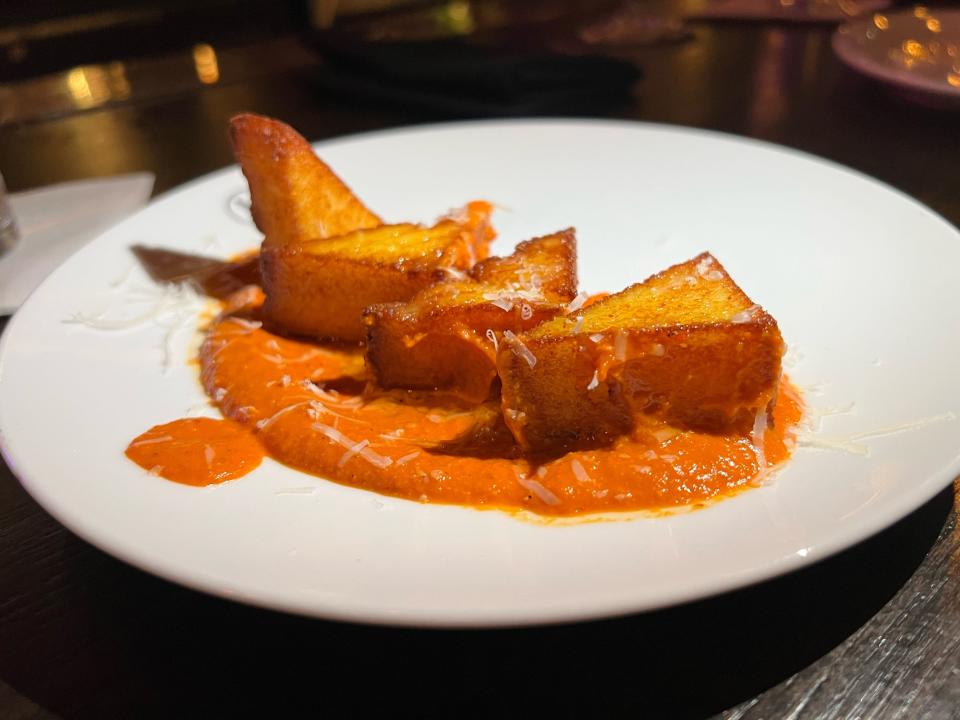 Polenta fries with Romesco sauce at Madame in Jersey City, as featured during a Beyond the Plate food tour.