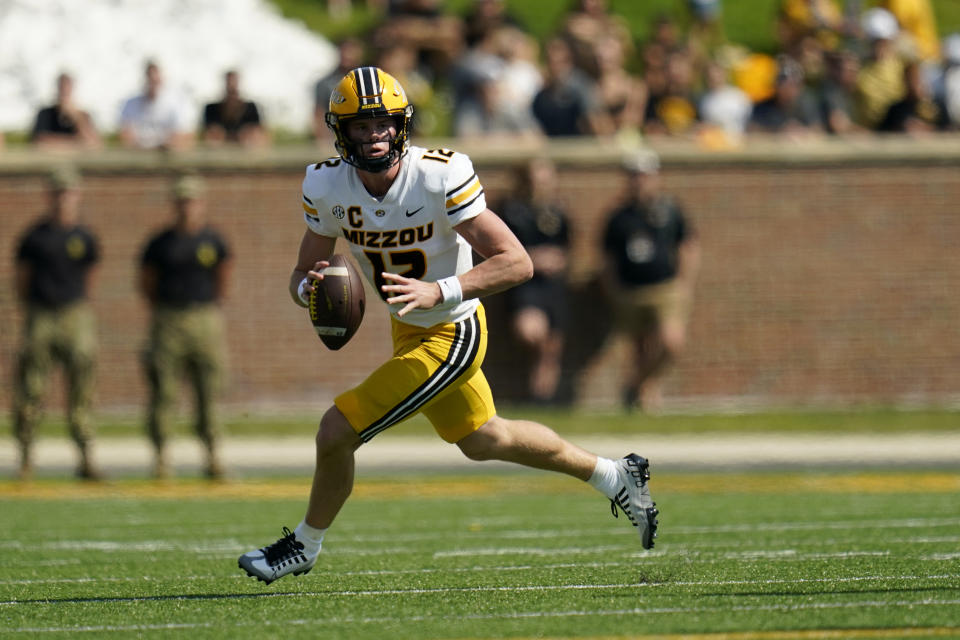 Missouri quarterback Brady Cook scrambles during the first half of an NCAA college football game against Abilene Christian Saturday, Sept. 17, 2022, in Columbia, Mo. (AP Photo/Jeff Roberson)