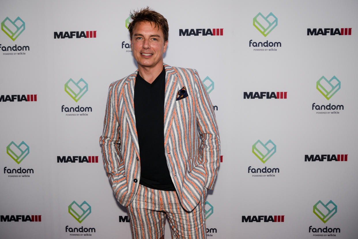 SAN DIEGO, CA - JULY 21:  Actor John Barrowman poses at the red carpet entrance of the Fandom Powered by Wikia/ Mafia III Comic -Con party at Float at Hard Rock Hotel San Diego on July 21, 2016 in San Diego, California.  (Photo by Kent Horner/Getty Images for Fandom)