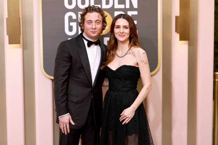 Closeup of Jeremy Allen White and Addison Timlin on the red carpet of the Golden Globes