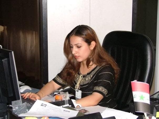 A 2004 picture of Zainab Al-Fatlawi in Baghdad when she worked for the the Iraqi media engagement team at the U.S. mission