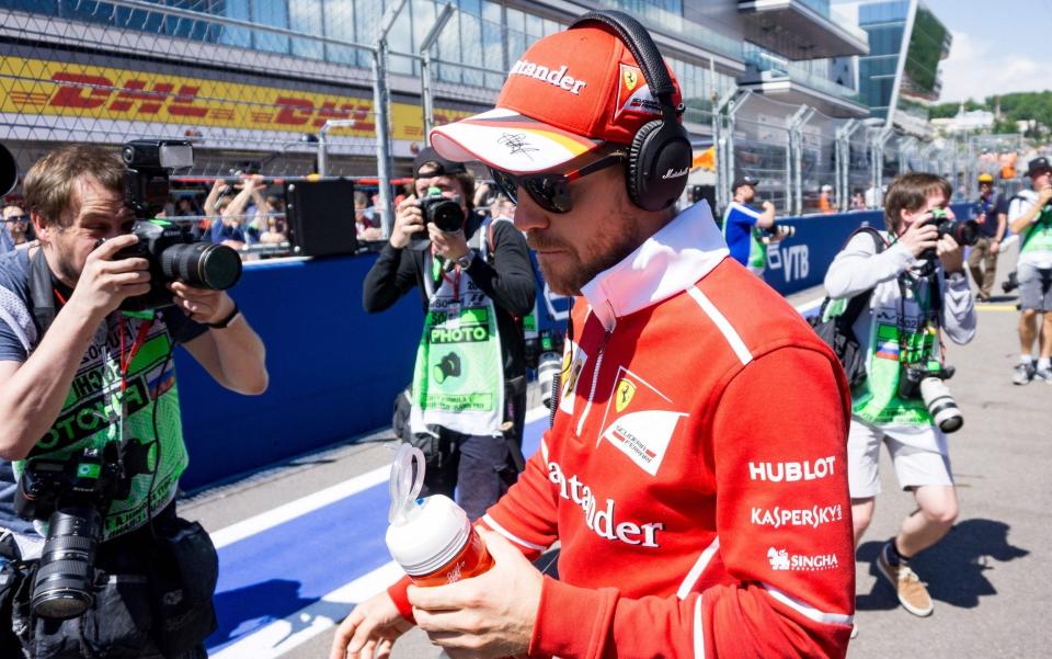 Sebastian Vettel ahead of the race in Sochi - Credit: ANDREJ ISAKOVIC /AFP