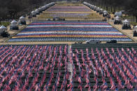 Flags are placed on the National Mall ahead of the inauguration of President-elect Joe Biden and Vice President-elect Kamala Harris, Monday, Jan. 18, 2021, in Washington. (AP Photo/Alex Brandon)