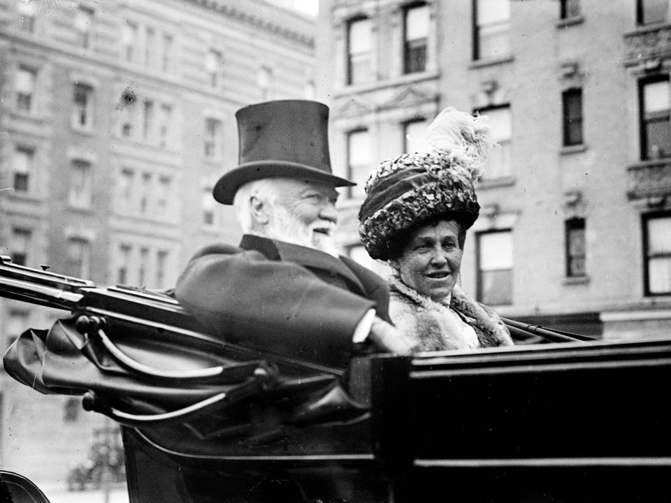 Andrew Carnegie and his wife photographed in a car in the early 20th century.