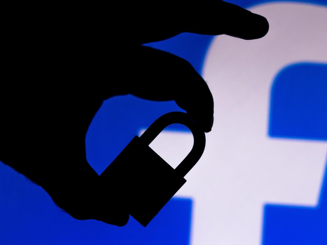 facebook lock BRAZIL - 2020/07/11: In this photo illustration a padlock appears next to the Facebook logo. Online data protection/breach concept. Internet privacy issues. (Photo Illustration by Rafael Henrique/SOPA Images/LightRocket via Getty Images)