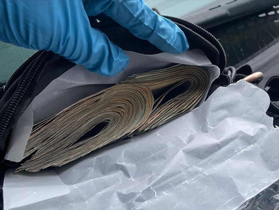 A wad of cash is shown in this image shared by the California Highway Patrol on June 18, 2024.