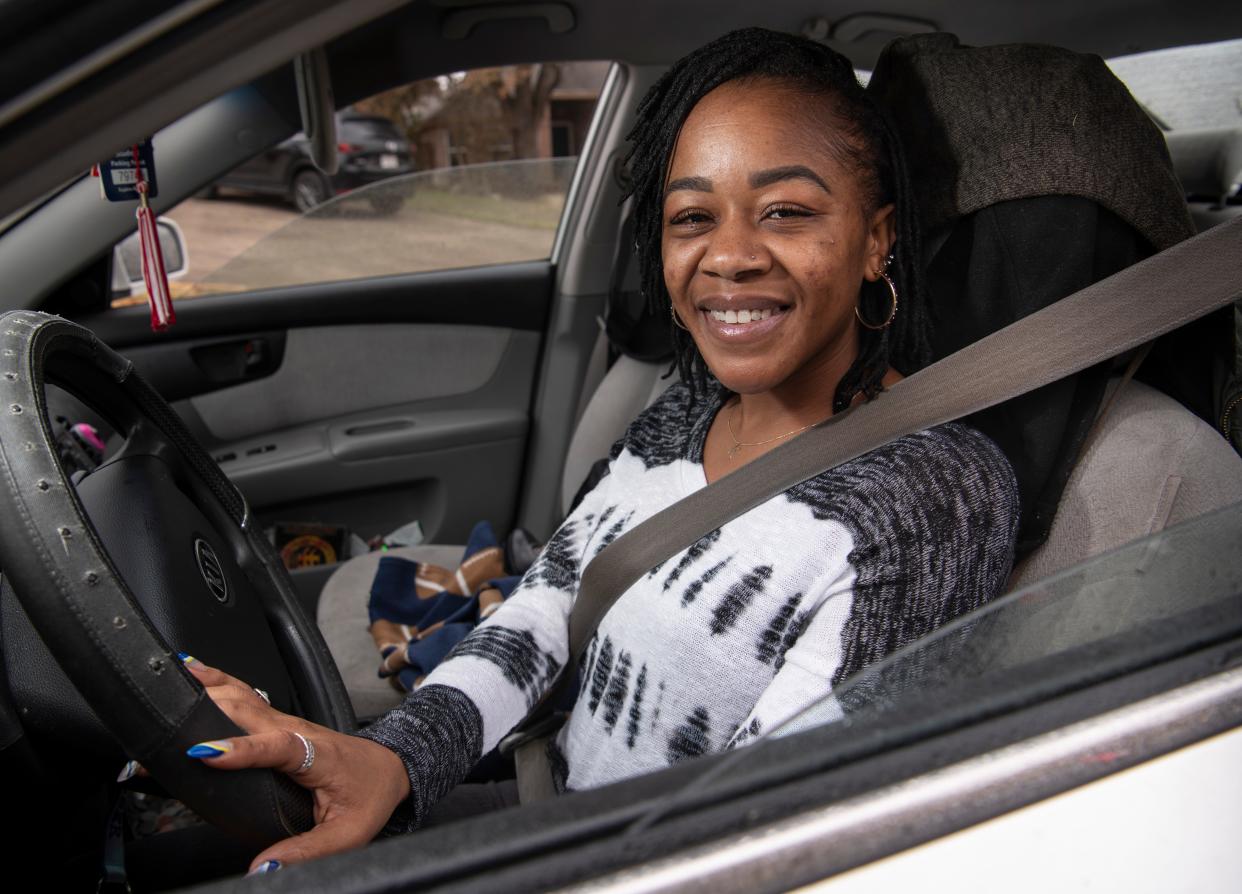 Amber Bradshaw poses for a portrait Thursday, Feb. 25, 2021 in Austin, Texas. Bradshaw was part of a team of drivers who delivered supplies to neighbors who were stuck at home during the winter storm. 