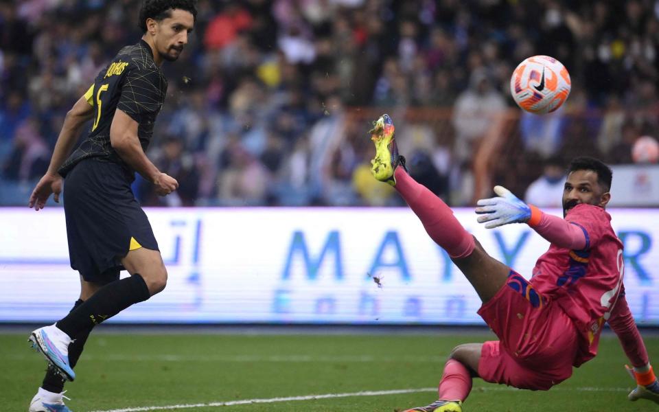 Paris Saint-Germain's Brazilian defender Marquinhos (L) shoots to score his team's second goal during the Riyadh - AFP