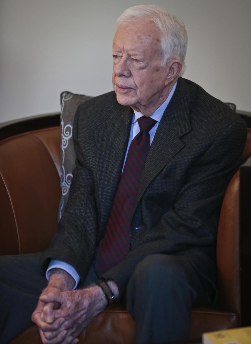 Former U.S. President Jimmy Carter speaks during an interview on Monday March 24, 2014 in New York. Carter says he doesn't support the Palestinian-led "boycott, divest, sanction" campaign against Israel but says products made in Israel-occupied Palestinian territories should be clearly labeled. (AP Photo/Bebeto Matthews)