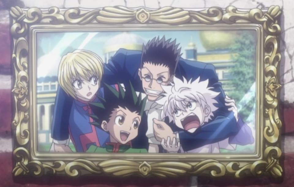Kurapika, Leorio, Gon, and Killua in a framed photo