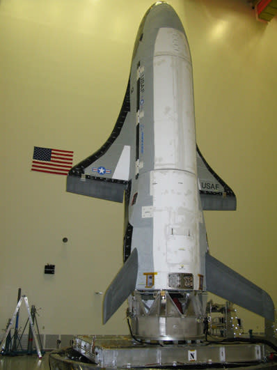 The X-37B/OTV spacecraft undergoes final testing at Boeing for a 2010 test flight. Click to enlarge.