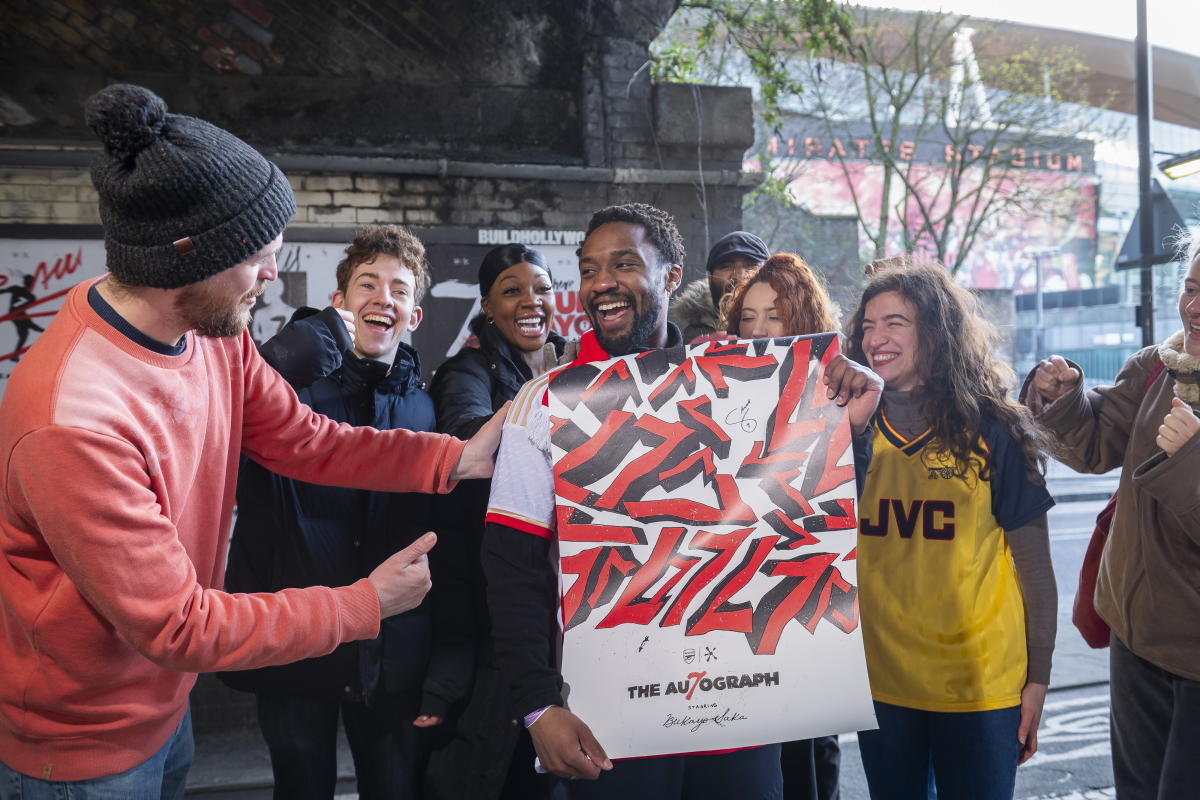 Footy fans descended on North London in the hunt posters signed by Arsenal star Bukayo Saka