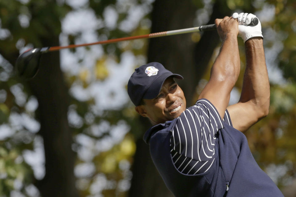 USA's Tiger Woods hits a drive on the third hole during a four-ball match at the Ryder Cup PGA golf tournament Saturday, Sept. 29, 2012, at the Medinah Country Club in Medinah, Ill. (AP Photo/David J. Phillip)